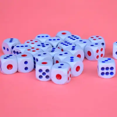 Color Game: pile of dice on pink background