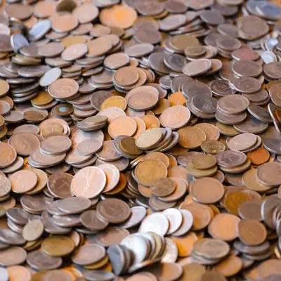 Money Coming: pile of coins